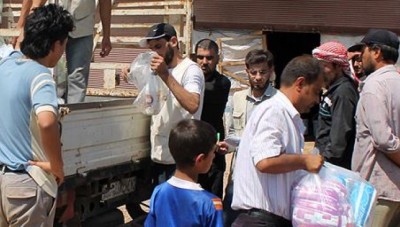 توزيع 3000 سلة إغاثية بريف دمشق