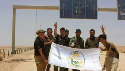 ميليشيات إيرانية تنتشر في معبر الوليد الحدودي مع سوريا (صور)