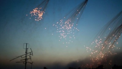 إعدام شاب بالرقة وقصف بالفوسفور الأبيض على أحيائها