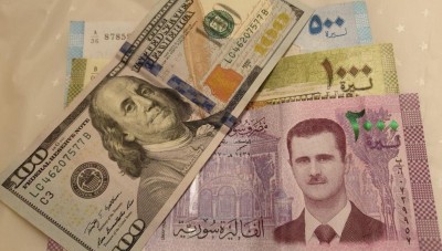 تحسن جديد  لليرة السورية وتراجع في أسعار الدولار والذهب 