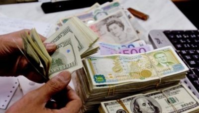 الدولار يحافظ على بعض مكاسبه في افتتاح تداولات الأربعاء