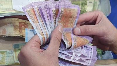 الليرة السورية تحافظ على مكاسبها في افتتاح تعاملات الأحد