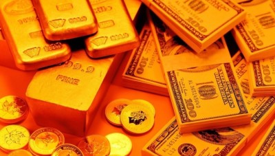الدولار يسجل سعراً جديداً و الذهب يتراجع  في تداولات الثلاثاء  
