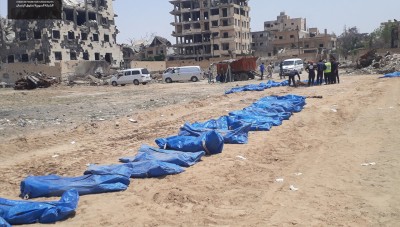 تقرير: استخراج 6 آلاف جثة من عشرات المقابر الجماعية لتنظيم الدولة في سوريا 