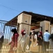 إخراج طالبة إعدادية من منزلها المقفل عبر رافعة للدفاع المدني لحضور امتحان في حلب
